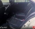 Білий Міцубісі Lancer, об'ємом двигуна 2 л та пробігом 258 тис. км за 6400 $, фото 12 на Automoto.ua