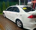 Белый Мицубиси Лансер, объемом двигателя 2 л и пробегом 254 тыс. км за 5850 $, фото 1 на Automoto.ua