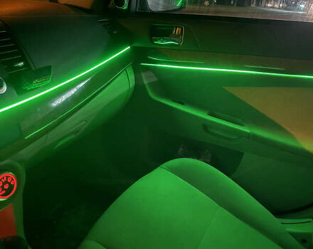 Белый Мицубиси Лансер, объемом двигателя 2 л и пробегом 220 тыс. км за 6000 $, фото 13 на Automoto.ua