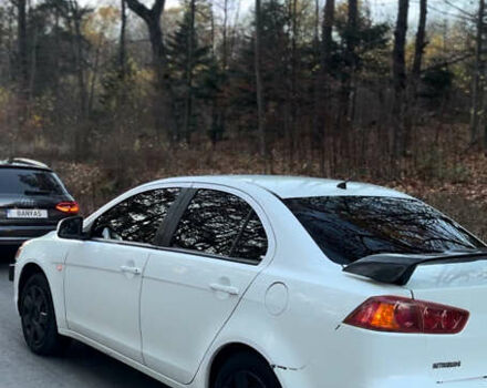 Белый Мицубиси Лансер, объемом двигателя 1.5 л и пробегом 255 тыс. км за 5777 $, фото 1 на Automoto.ua