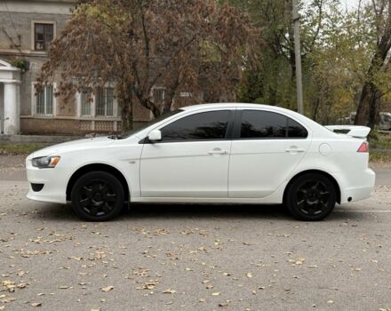 Белый Мицубиси Лансер, объемом двигателя 1.5 л и пробегом 265 тыс. км за 5600 $, фото 3 на Automoto.ua