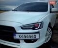 Белый Мицубиси Лансер, объемом двигателя 2 л и пробегом 188 тыс. км за 7800 $, фото 1 на Automoto.ua