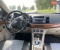 Белый Мицубиси Лансер, объемом двигателя 2 л и пробегом 167 тыс. км за 7400 $, фото 46 на Automoto.ua