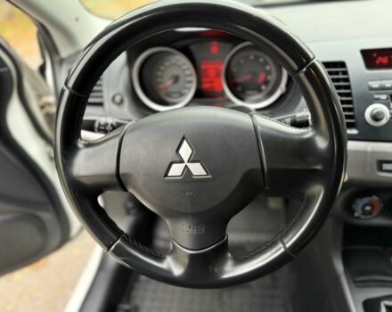 Белый Мицубиси Лансер, объемом двигателя 1.5 л и пробегом 265 тыс. км за 5600 $, фото 6 на Automoto.ua