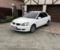 Білий Міцубісі Lancer, об'ємом двигуна 1.6 л та пробігом 285 тис. км за 3500 $, фото 1 на Automoto.ua