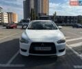 Білий Міцубісі Lancer, об'ємом двигуна 2 л та пробігом 289 тис. км за 5500 $, фото 1 на Automoto.ua