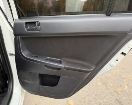 Белый Мицубиси Лансер, объемом двигателя 1.5 л и пробегом 265 тыс. км за 5600 $, фото 23 на Automoto.ua