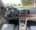 Белый Мицубиси Лансер, объемом двигателя 2 л и пробегом 167 тыс. км за 7400 $, фото 29 на Automoto.ua