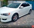 Білий Міцубісі Lancer, об'ємом двигуна 2 л та пробігом 258 тис. км за 6400 $, фото 1 на Automoto.ua