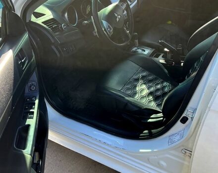 Белый Мицубиси Лансер, объемом двигателя 2 л и пробегом 230 тыс. км за 6700 $, фото 3 на Automoto.ua