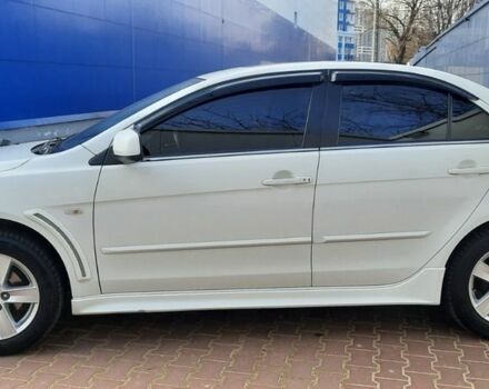 Белый Мицубиси Лансер, объемом двигателя 1.5 л и пробегом 182 тыс. км за 7100 $, фото 4 на Automoto.ua