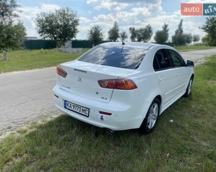 Белый Мицубиси Лансер, объемом двигателя 2 л и пробегом 167 тыс. км за 7400 $, фото 11 на Automoto.ua