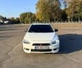 Білий Міцубісі Lancer, об'ємом двигуна 1.5 л та пробігом 239 тис. км за 7100 $, фото 1 на Automoto.ua