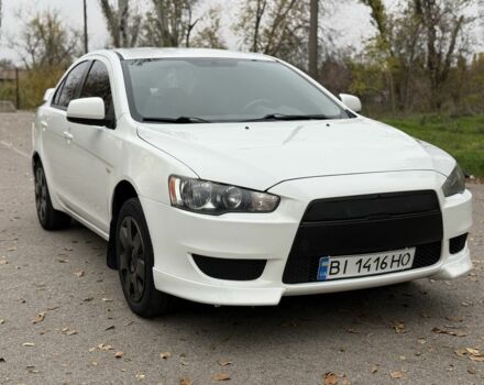 Белый Мицубиси Лансер, объемом двигателя 1.5 л и пробегом 265 тыс. км за 5600 $, фото 21 на Automoto.ua