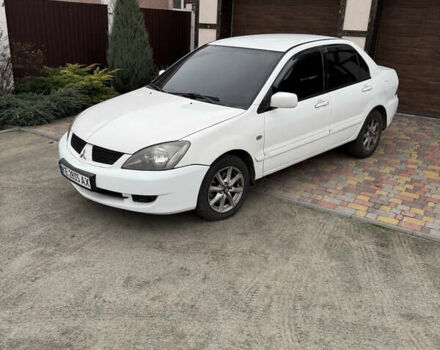 Белый Мицубиси Лансер, объемом двигателя 1.58 л и пробегом 285 тыс. км за 3500 $, фото 1 на Automoto.ua