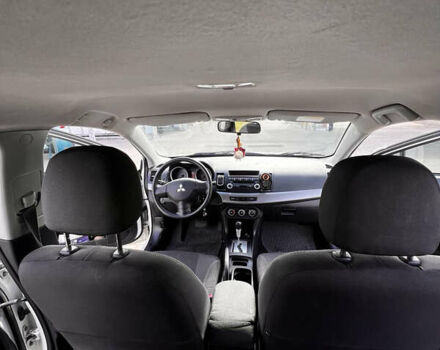 Белый Мицубиси Лансер, объемом двигателя 1.5 л и пробегом 135 тыс. км за 7500 $, фото 4 на Automoto.ua