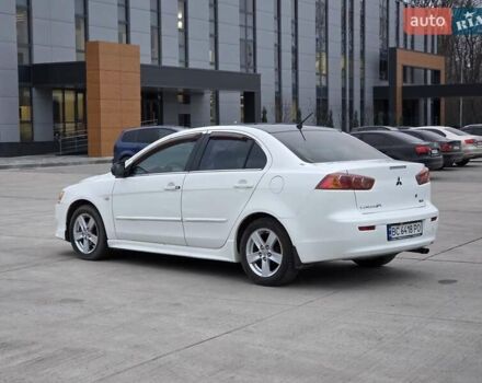 Белый Мицубиси Лансер, объемом двигателя 2 л и пробегом 218 тыс. км за 5555 $, фото 10 на Automoto.ua