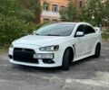 Білий Міцубісі Lancer, об'ємом двигуна 2 л та пробігом 305 тис. км за 5700 $, фото 1 на Automoto.ua