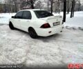 Білий Міцубісі Lancer, об'ємом двигуна 1.6 л та пробігом 222 тис. км за 5500 $, фото 1 на Automoto.ua