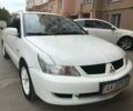 Белый Мицубиси Лансер, объемом двигателя 1.6 л и пробегом 208 тыс. км за 5500 $, фото 1 на Automoto.ua