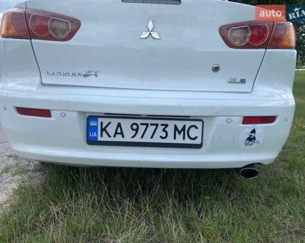 Белый Мицубиси Лансер, объемом двигателя 2 л и пробегом 167 тыс. км за 7400 $, фото 12 на Automoto.ua