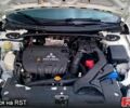 Білий Міцубісі Lancer, об'ємом двигуна 2 л та пробігом 258 тис. км за 6400 $, фото 13 на Automoto.ua