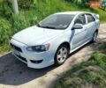 Білий Міцубісі Lancer, об'ємом двигуна 2 л та пробігом 220 тис. км за 3750 $, фото 1 на Automoto.ua