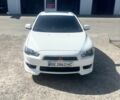 Білий Міцубісі Lancer, об'ємом двигуна 1.5 л та пробігом 192 тис. км за 6500 $, фото 1 на Automoto.ua