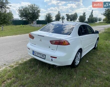 Белый Мицубиси Лансер, объемом двигателя 2 л и пробегом 167 тыс. км за 7400 $, фото 10 на Automoto.ua