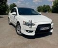 Белый Мицубиси Лансер, объемом двигателя 2 л и пробегом 275 тыс. км за 5999 $, фото 1 на Automoto.ua