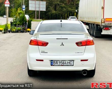 Белый Мицубиси Лансер, объемом двигателя 2 л и пробегом 185 тыс. км за 7999 $, фото 4 на Automoto.ua