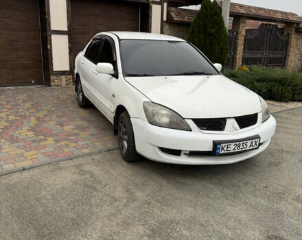 Белый Мицубиси Лансер, объемом двигателя 1.58 л и пробегом 285 тыс. км за 3500 $, фото 6 на Automoto.ua