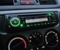Белый Мицубиси Лансер, объемом двигателя 1.6 л и пробегом 59 тыс. км за 6700 $, фото 48 на Automoto.ua
