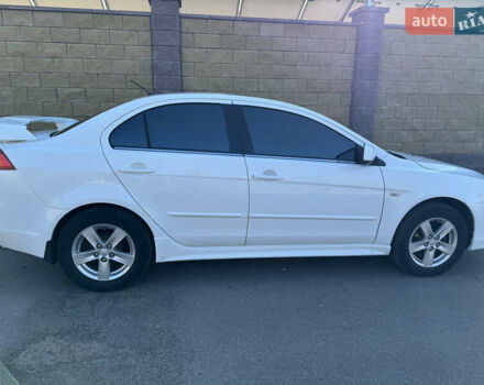 Белый Мицубиси Лансер, объемом двигателя 1.47 л и пробегом 230 тыс. км за 5800 $, фото 6 на Automoto.ua