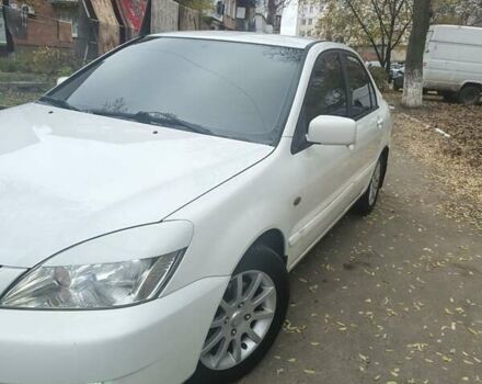 Белый Мицубиси Лансер, объемом двигателя 1.59 л и пробегом 222 тыс. км за 4950 $, фото 4 на Automoto.ua