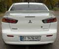 Белый Мицубиси Лансер, объемом двигателя 1.5 л и пробегом 265 тыс. км за 5600 $, фото 20 на Automoto.ua