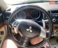 Белый Мицубиси Лансер, объемом двигателя 2 л и пробегом 167 тыс. км за 7400 $, фото 40 на Automoto.ua