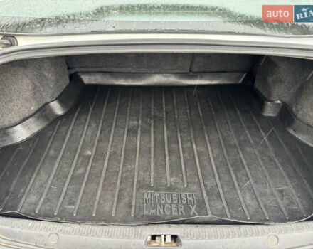 Белый Мицубиси Лансер, объемом двигателя 1.47 л и пробегом 230 тыс. км за 5800 $, фото 22 на Automoto.ua