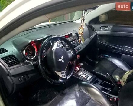 Белый Мицубиси Лансер, объемом двигателя 2 л и пробегом 254 тыс. км за 5850 $, фото 4 на Automoto.ua