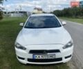 Белый Мицубиси Лансер, объемом двигателя 2 л и пробегом 167 тыс. км за 7400 $, фото 16 на Automoto.ua