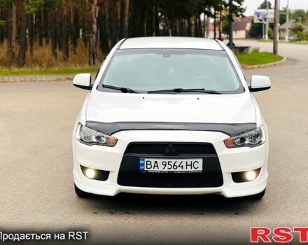 Белый Мицубиси Лансер, объемом двигателя 2 л и пробегом 185 тыс. км за 7999 $, фото 7 на Automoto.ua