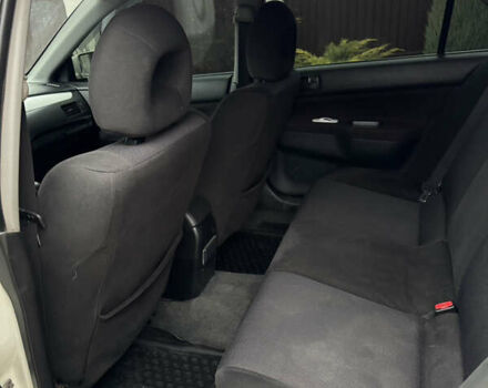 Белый Мицубиси Лансер, объемом двигателя 1.58 л и пробегом 285 тыс. км за 3500 $, фото 11 на Automoto.ua