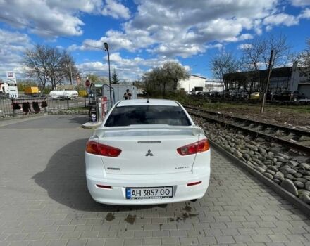 Білий Міцубісі Lancer, об'ємом двигуна 2 л та пробігом 182 тис. км за 7400 $, фото 9 на Automoto.ua