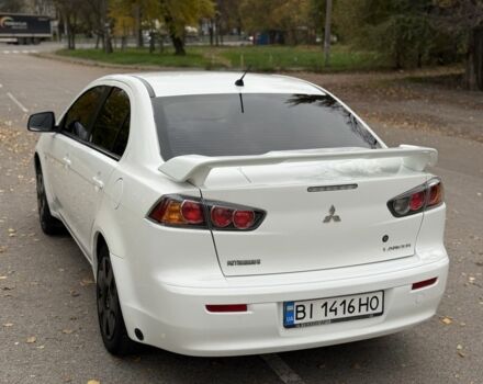 Белый Мицубиси Лансер, объемом двигателя 1.5 л и пробегом 265 тыс. км за 5600 $, фото 2 на Automoto.ua
