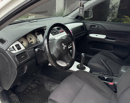 Белый Мицубиси Лансер, объемом двигателя 1.58 л и пробегом 285 тыс. км за 3500 $, фото 8 на Automoto.ua