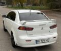 Белый Мицубиси Лансер, объемом двигателя 1.5 л и пробегом 265 тыс. км за 5600 $, фото 2 на Automoto.ua