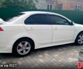 Білий Міцубісі Lancer, об'ємом двигуна 2 л та пробігом 258 тис. км за 6400 $, фото 1 на Automoto.ua