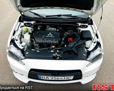 Белый Мицубиси Лансер, объемом двигателя 2 л и пробегом 185 тыс. км за 7999 $, фото 13 на Automoto.ua