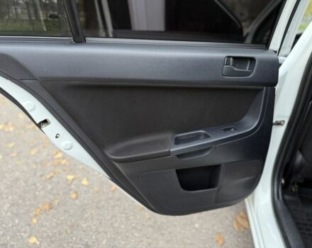 Белый Мицубиси Лансер, объемом двигателя 1.5 л и пробегом 265 тыс. км за 5600 $, фото 22 на Automoto.ua