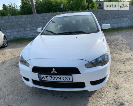 Білий Міцубісі Lancer, об'ємом двигуна 1.5 л та пробігом 206 тис. км за 6500 $, фото 1 на Automoto.ua